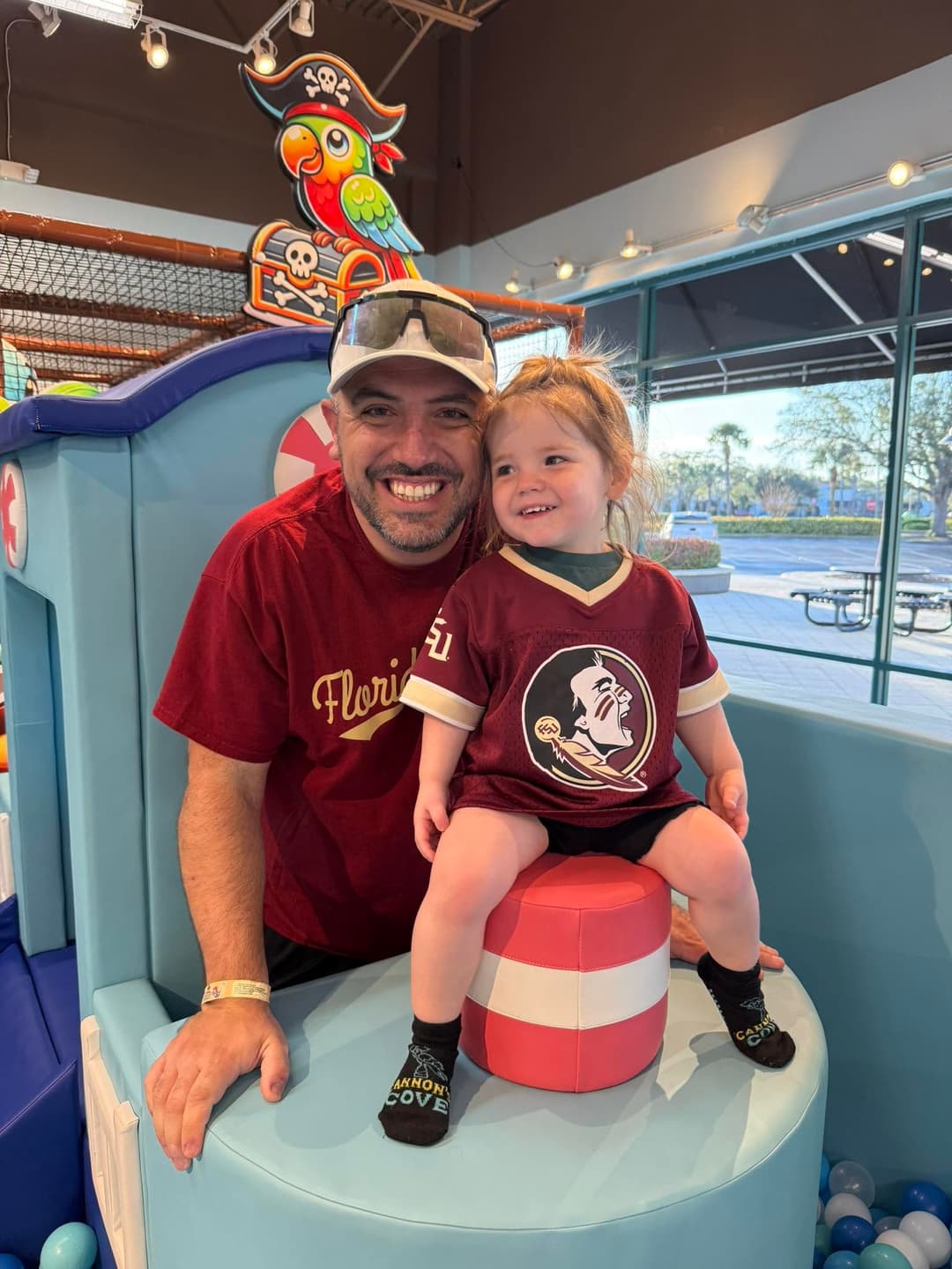 Moose with his daughter in FSU gear