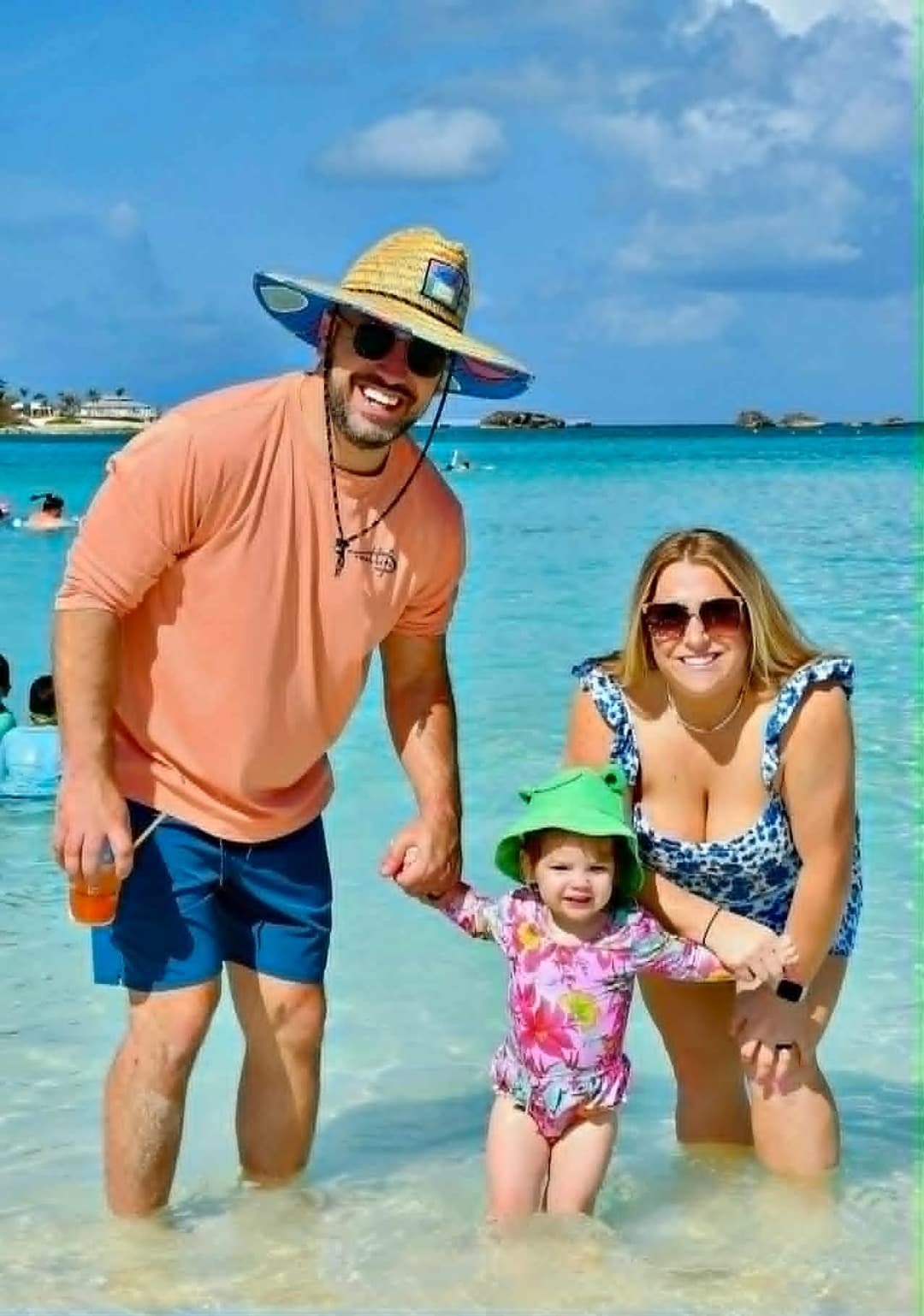 Moose with his wife and daughter at the beach